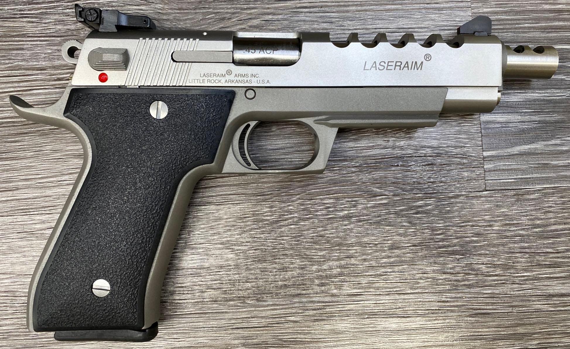 BOXED STAINLESS STEEL LASERAIM ARMS .45 ACP SEMI-AUTO PISTOL