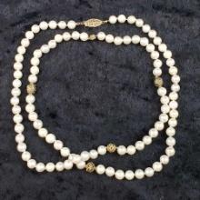 STRAND OF CULTURED JAPANESE PEARLS w/ 14K YELLOW GOLD CLASP