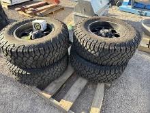 (4) YOKOHAMA GEOLANDER TIRES ON FUEL WHEELS