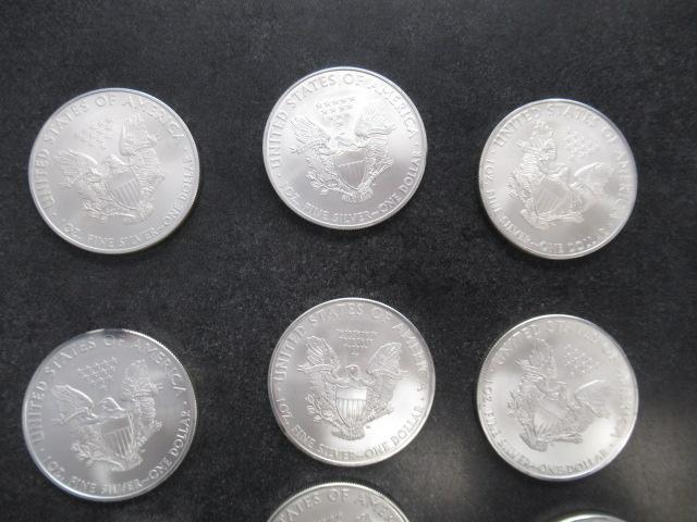 (10) 2010 1OZ SILVER DOLLARS