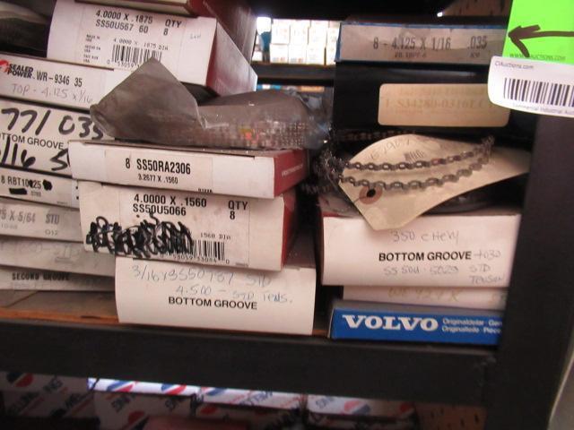 CONTENTS OF SHELF - ASSORTED PISTON RINGS & OIL PICKUPS