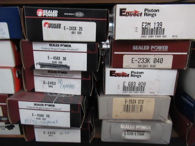 CONTENTS OF SHELF - ASSORTED PISTON RINGS & OIL PICKUPS