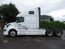 2015 VOLVO TANDEM AXLE HIGH ROOF SLEEPER CAB TRACTOR