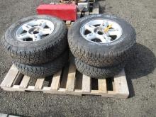(4) KELLY EDGE AT 235/70R16 TIRES ON FORD 5 LUG WHEELS