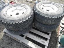 (4) BFG A/T 31X10.50R15LT TIRES ON MODIFIED 5 LUG WHEELS