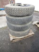 (4) BFG HAUL MASTER RIB 9.00-20 TIRES ON 10 LUG STEEL WHEELS