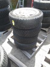 (4) SIGNET P245/75R16 STUDDED TIRES ON JEEP 5 LUG WHEELS, *HOLE IN (1) TIRE