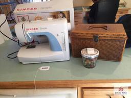 Singer 3116 sewing machine and accessories