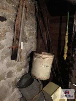 Contents of wall: Mobile can, hoses, cable, tarps, wire, etc.