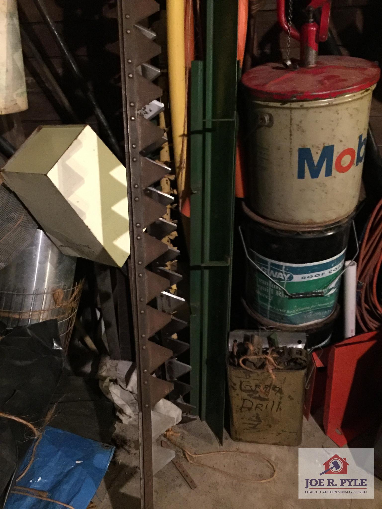 Contents of wall: Mobile can, hoses, cable, tarps, wire, etc.