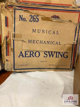 J. Chein Aero Swing with box and Tin and celluloid girl and umbrella, tested