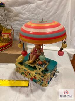 J. Chein Aero Swing with box and Tin and celluloid girl and umbrella, tested