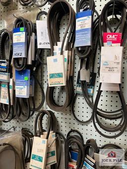 Assortment of Belts Hanging on Wall
