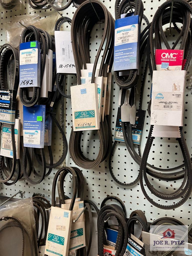 Assortment of Belts Hanging on Wall