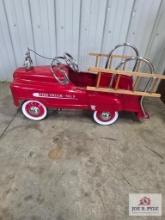 Red fire truck and ladder pedal car