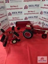 Farmall tractor with trailer and spreader