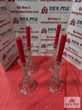 4 Glass candle holders with candles