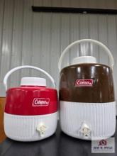 Vintage Coleman coolers and water jugs