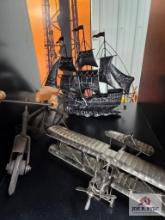 Vintage replica plane, ship and bicycle