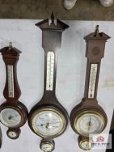 Collection of 3 clocks with thermometers