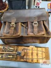 Assorted items with leather satchel and wooden horse wagon
