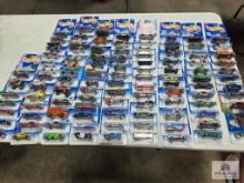 Tote of Hot Wheel cars