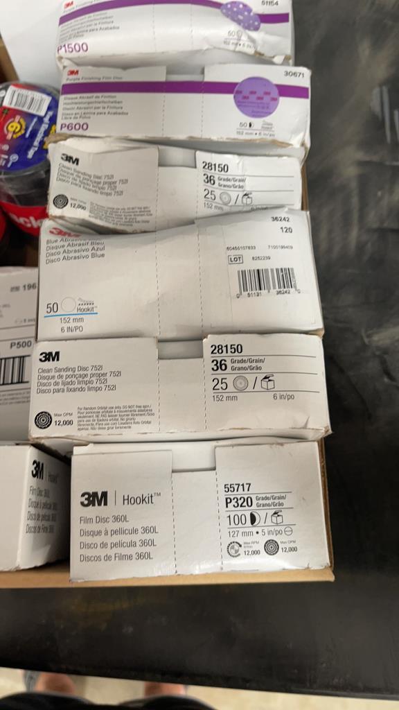 BOX OF MISC SANDPAPER AND ELECTRICAL TAPE