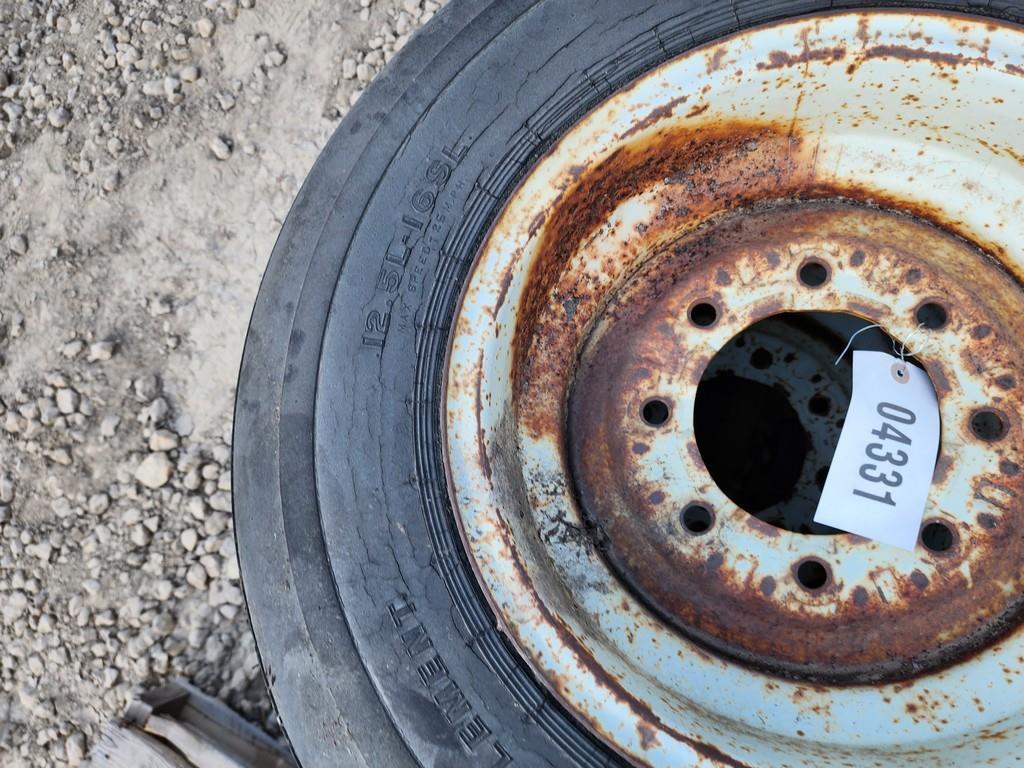 (2) 12.5 X 16 FLOTATION TIRES ON 8 HOLE RIMS