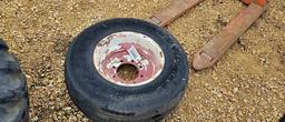8 BOLT 16" IMPLEMENT RIM W/ 12.5L -16 TIRE