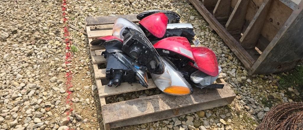 PALLET OF FORD HEADLIGHTS AND TAILIGHTS