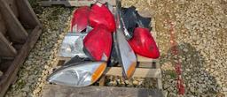 PALLET OF FORD HEADLIGHTS AND TAILIGHTS