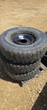 (3) MUD CLAW RADIAL TIRES