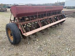 McCormick low rubber grain drill w/ grass seeder,