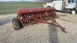 McCormick low rubber grain drill w/ grass seeder,