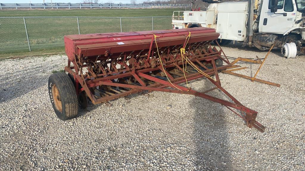 McCormick low rubber grain drill w/ grass seeder,