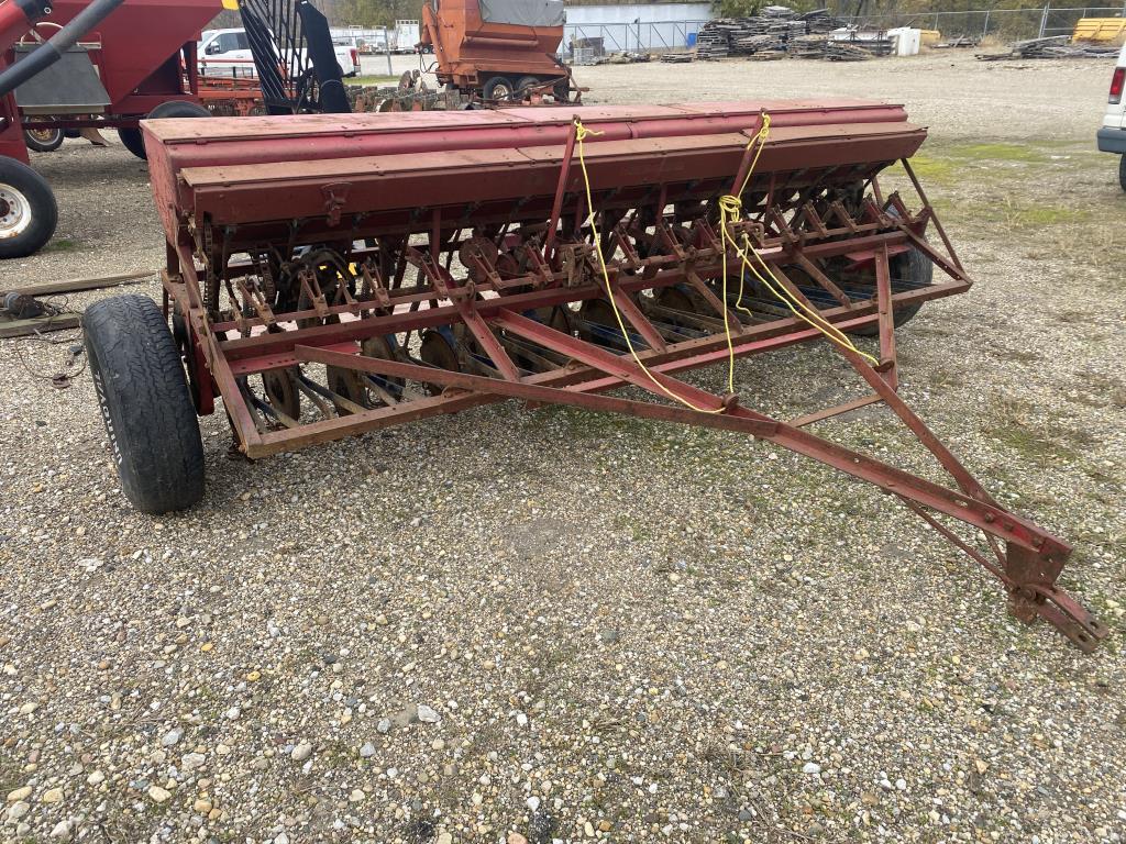 McCormick low rubber grain drill w/ grass seeder,