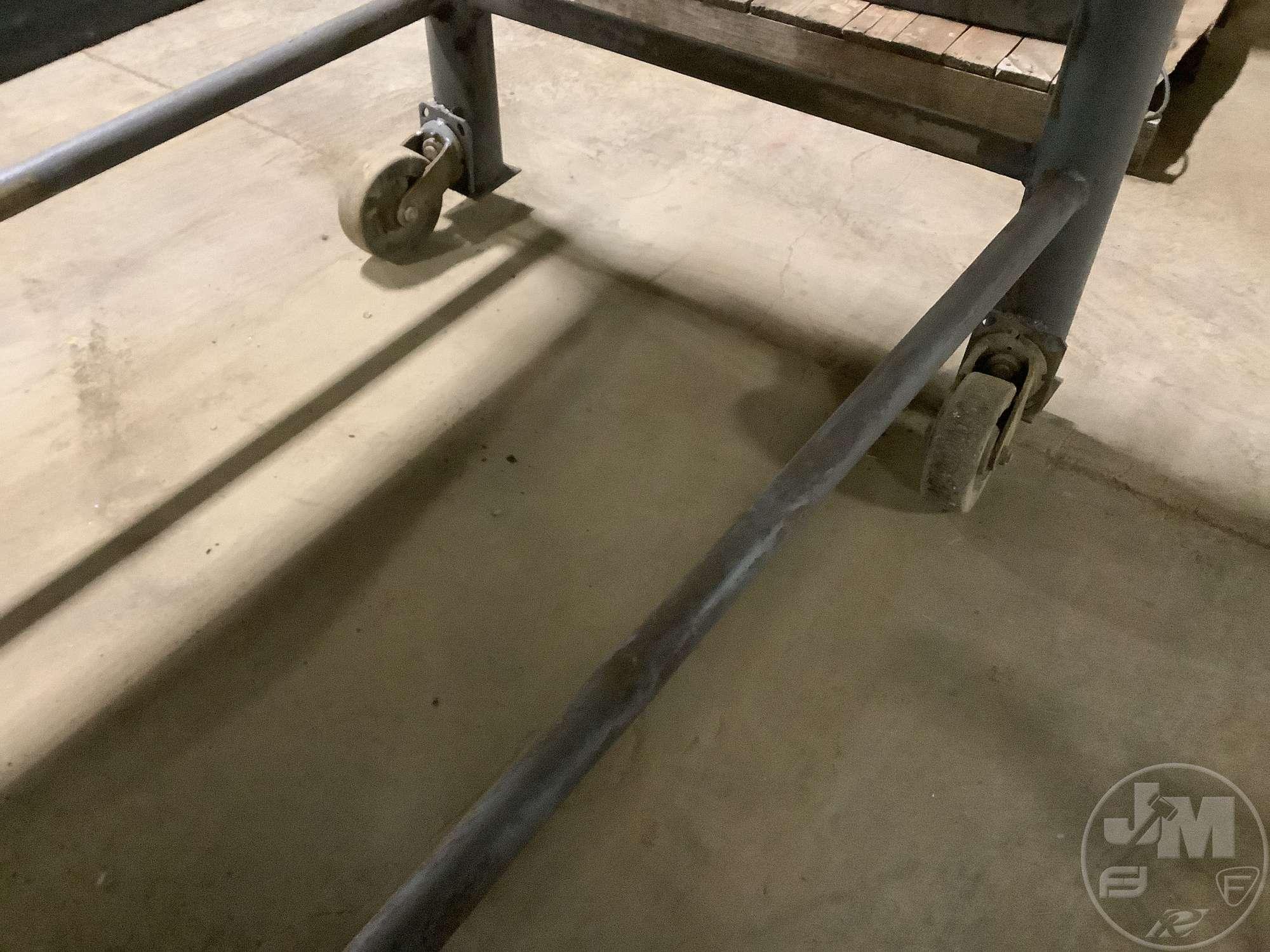 HEAVY DUTY STEEL WORK BENCH 4X8 ON CASTERS, HAS 2