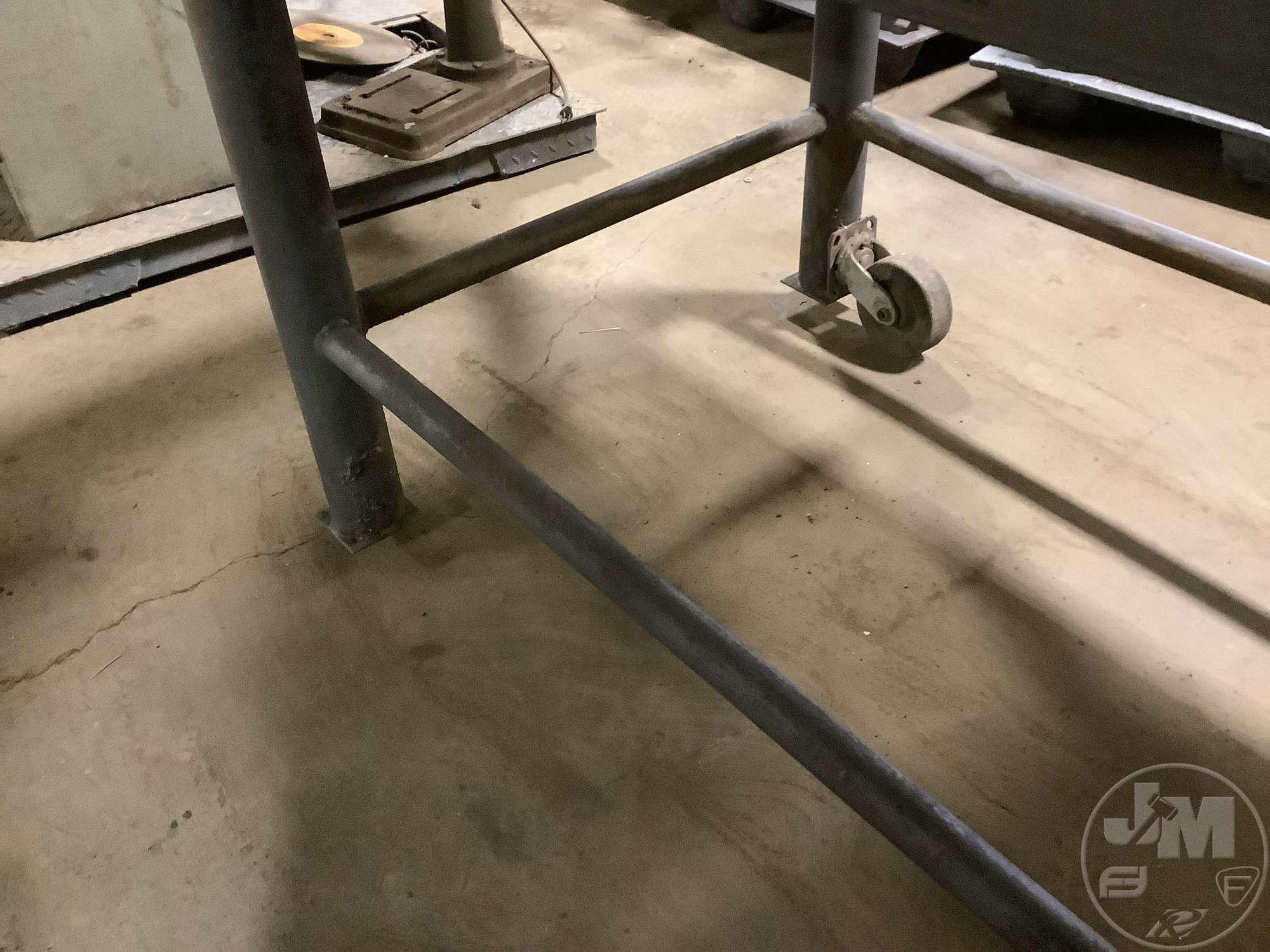 HEAVY DUTY STEEL WORK BENCH 4X8 ON CASTERS, HAS 2