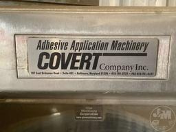 ADHESIVE APPLICATION MACHINE