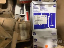MUD FLAPS, BOX WITH CUMMINS PARTS, PARTS SHELF