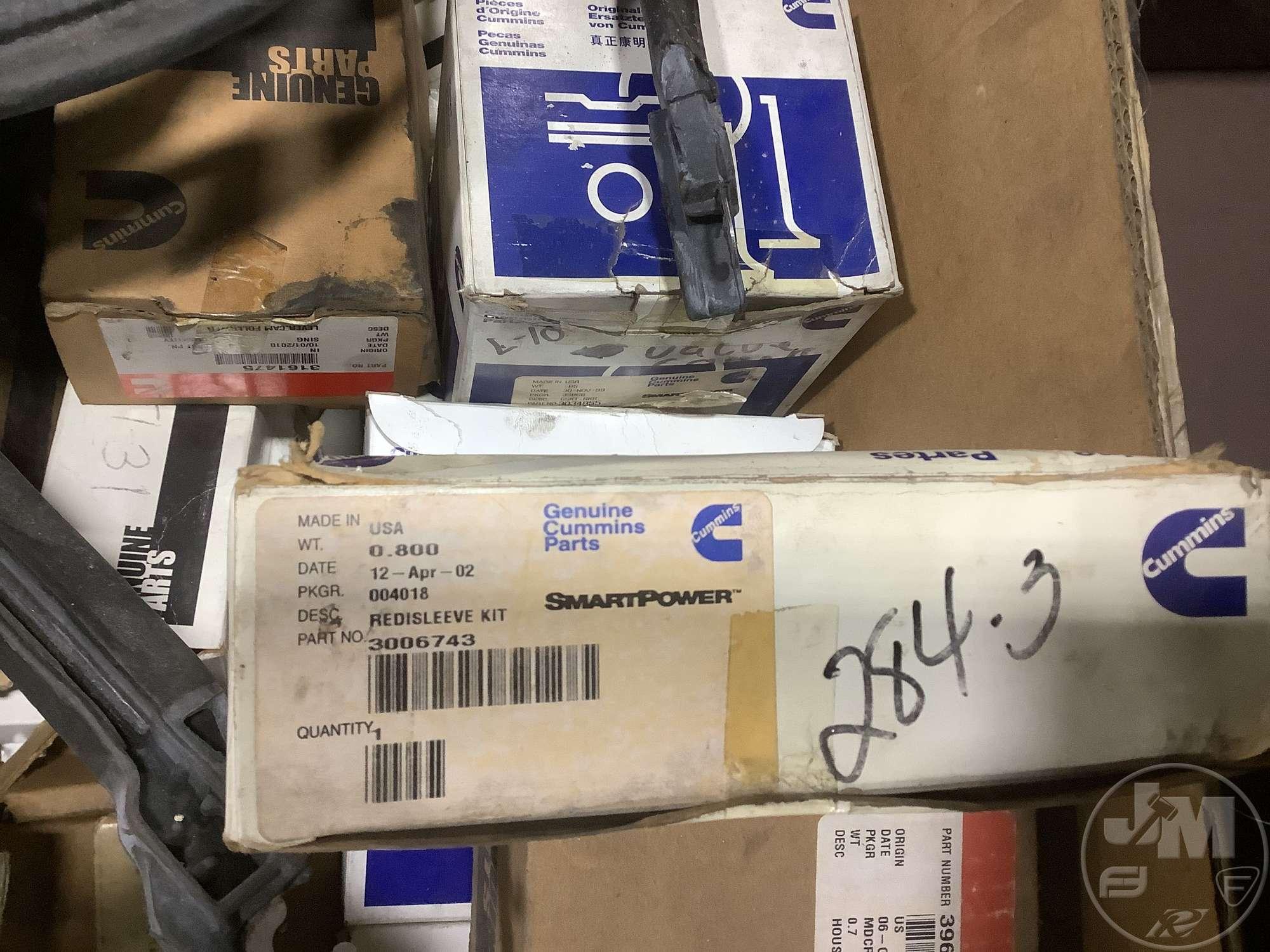 MUD FLAPS, BOX WITH CUMMINS PARTS, PARTS SHELF
