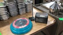 Another 48 Hrs. Clock, Tork Napkin Dispenser &