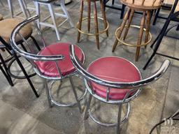 2 Swiveling Metal Stools