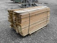Stack of New Wooden Fencing on Pallet