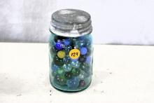 Blue jar of marbles