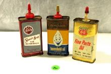 3 vintage oil tins