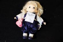 Precios Moments doll