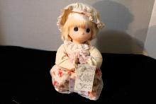 Precios Moments doll