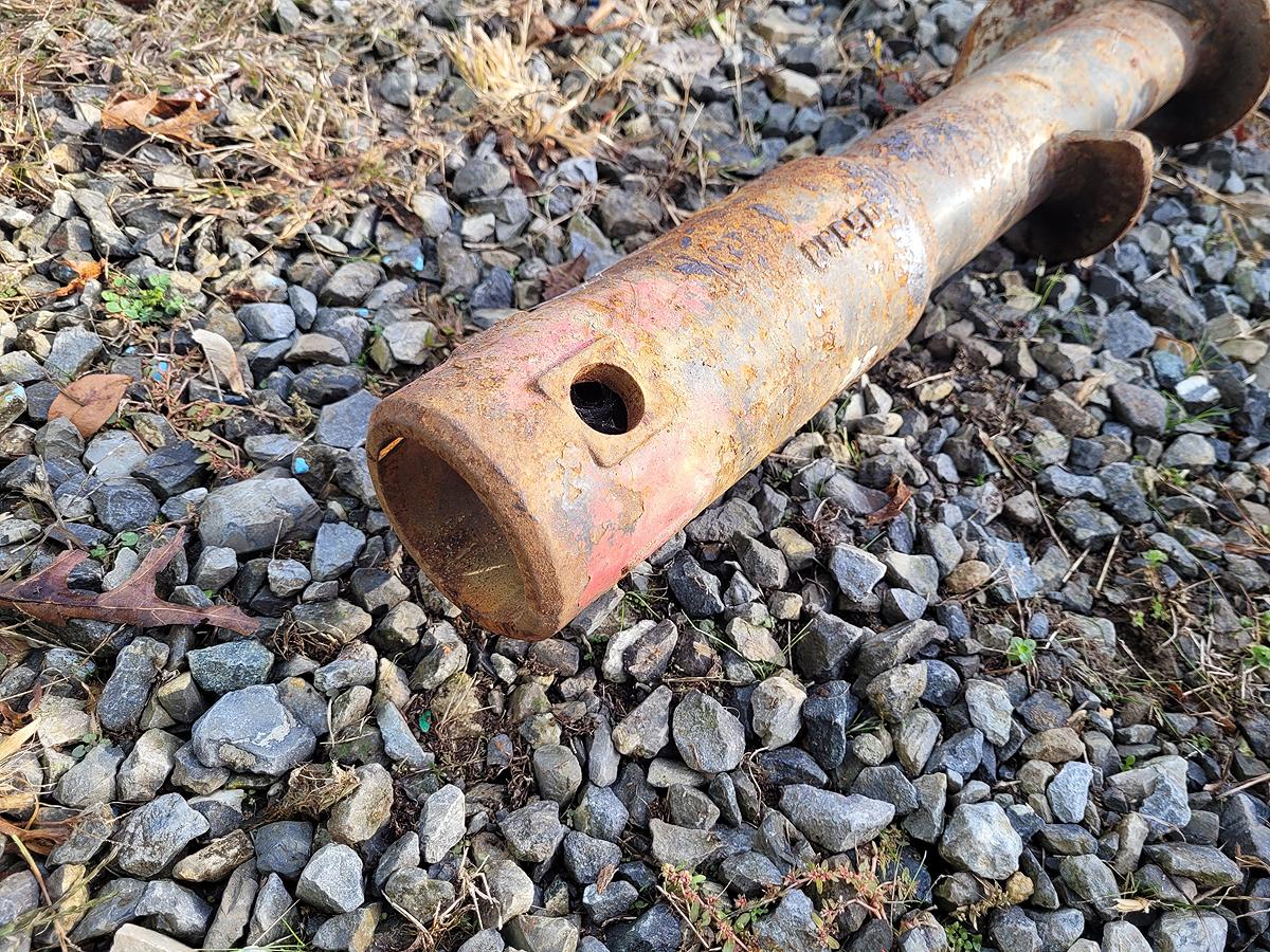 Bobcat Hydraulic Auger attatchment w/ 2" drive hex head and (2) Auger Drill bits