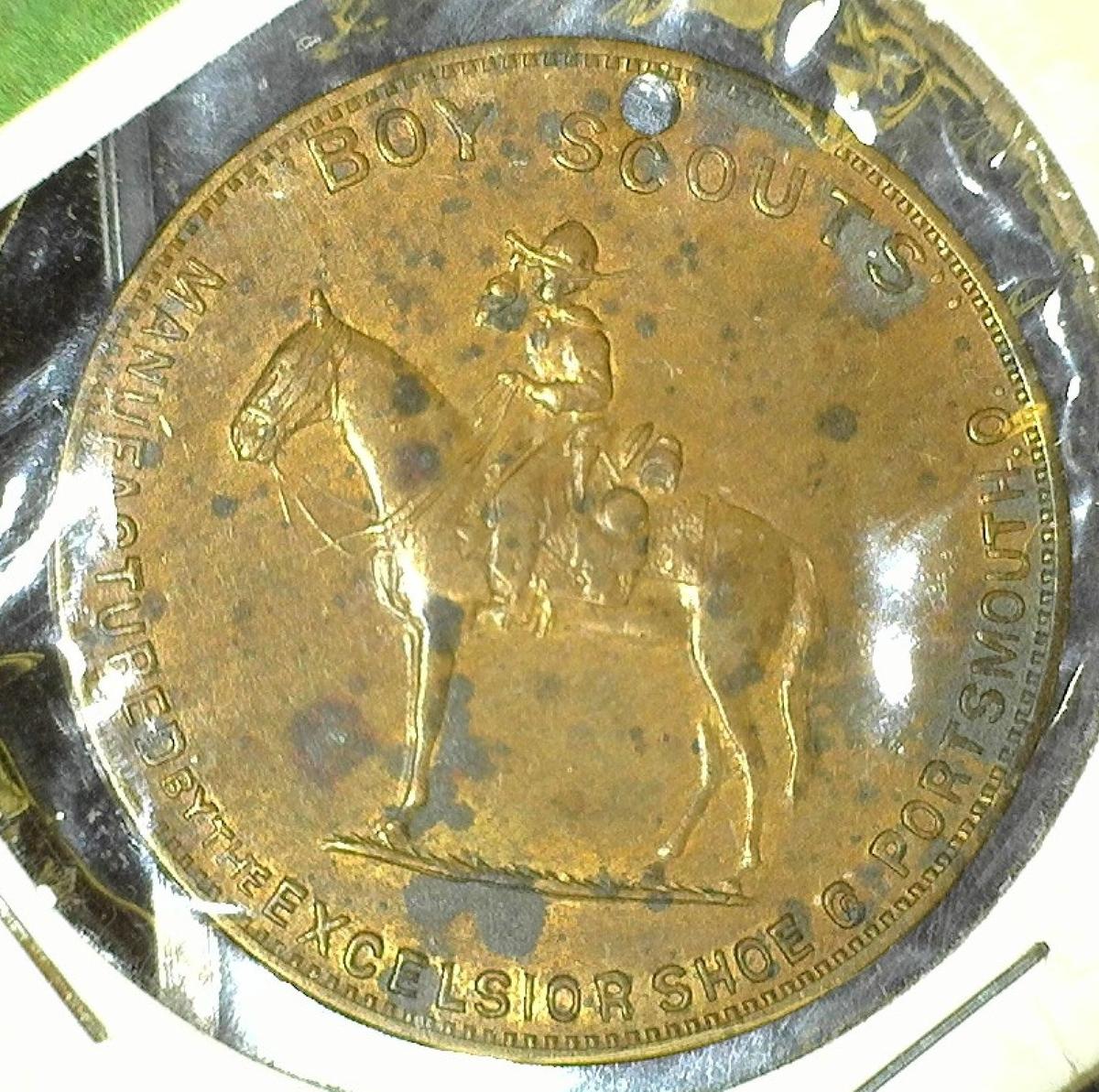 "Membership Emblem of the Boy Scouts Club/Good Luck", "Boy Scouts/Manufactured by the Excelsior Shoe